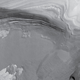 Illustration for article titled An ancient force that created the spiral ice chasms of Mars